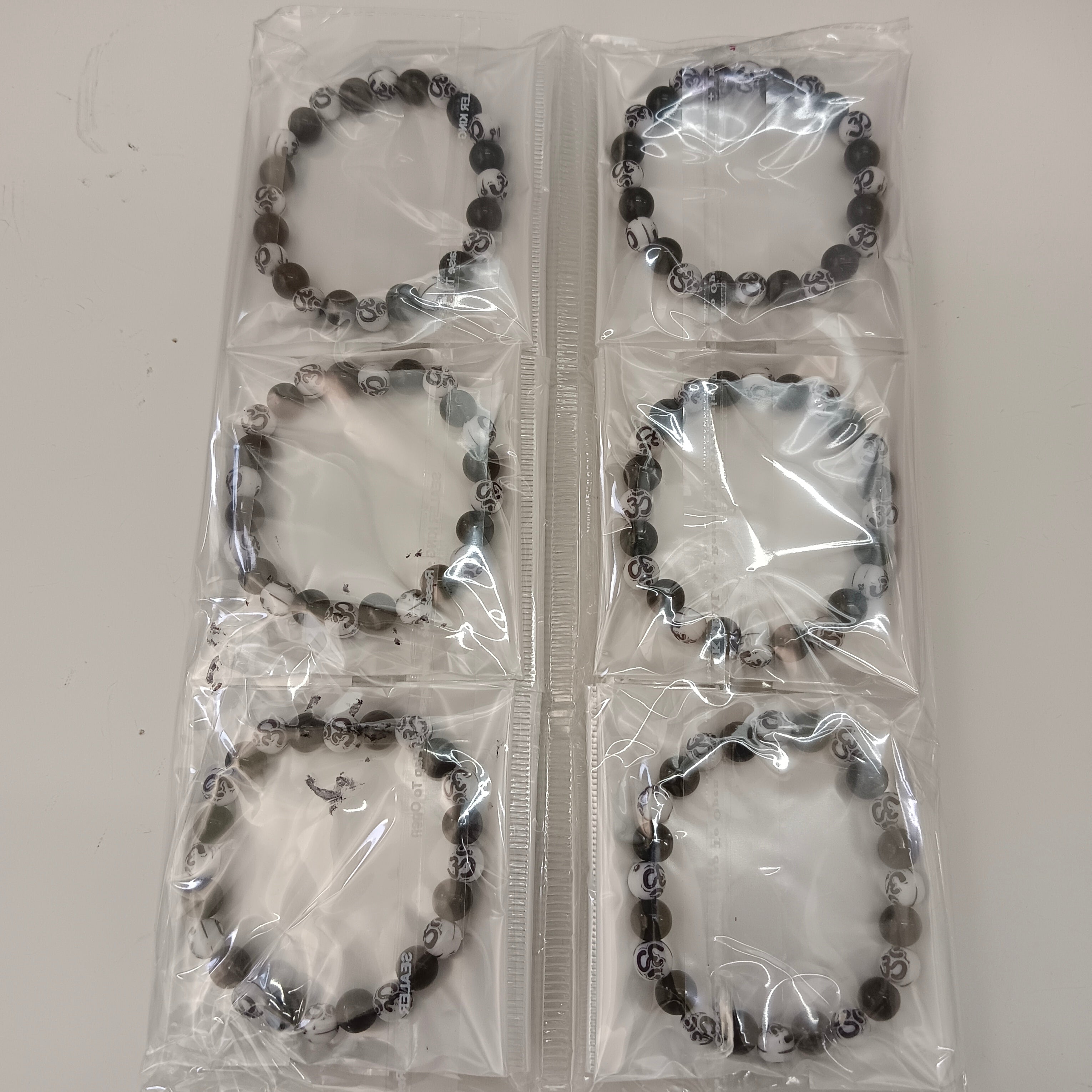 Urthn Om Beads Bracelet (Set Of 12)