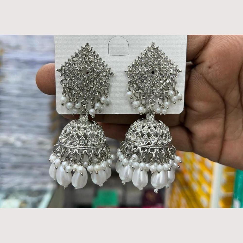 Manisha Jewellery Rhodium Plated Shiny Austrian Stone And Pearl Jhumki Earrings