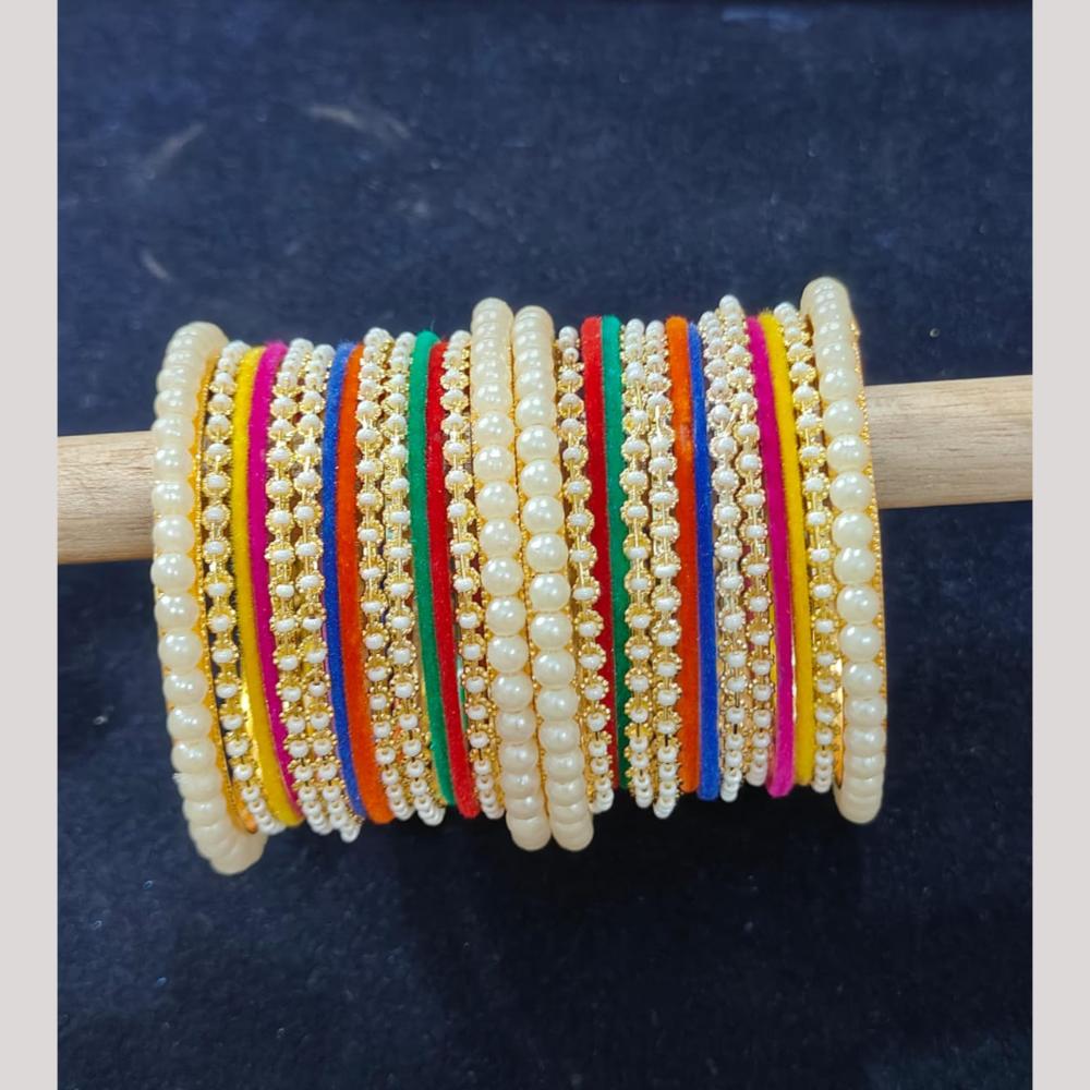 Pooja Bangles Gold Plated Pearl Velvet And Matel Bangles Set