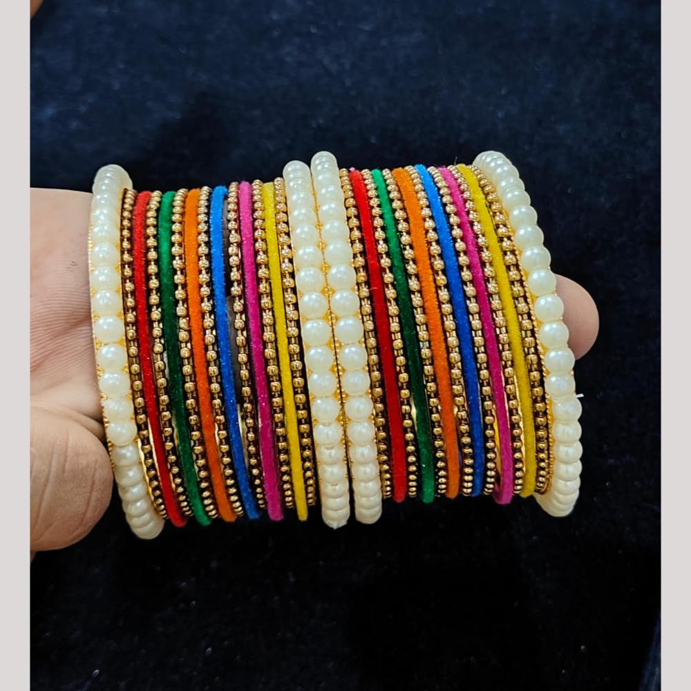Pooja Bangles Gold Plated Pearl Velvet And Matel Bangles Set