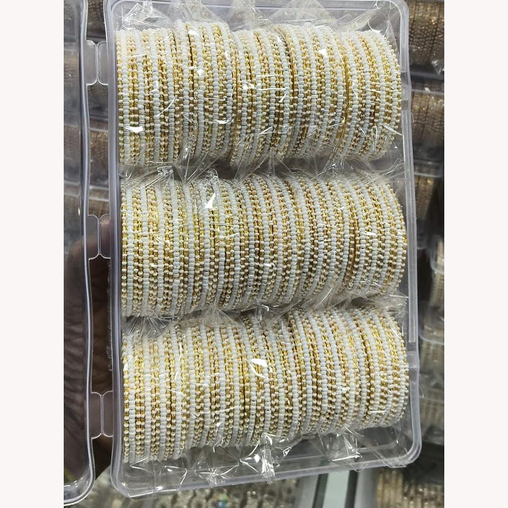 Pooja Bangles Graceful Pearl Embellished Bangles Set