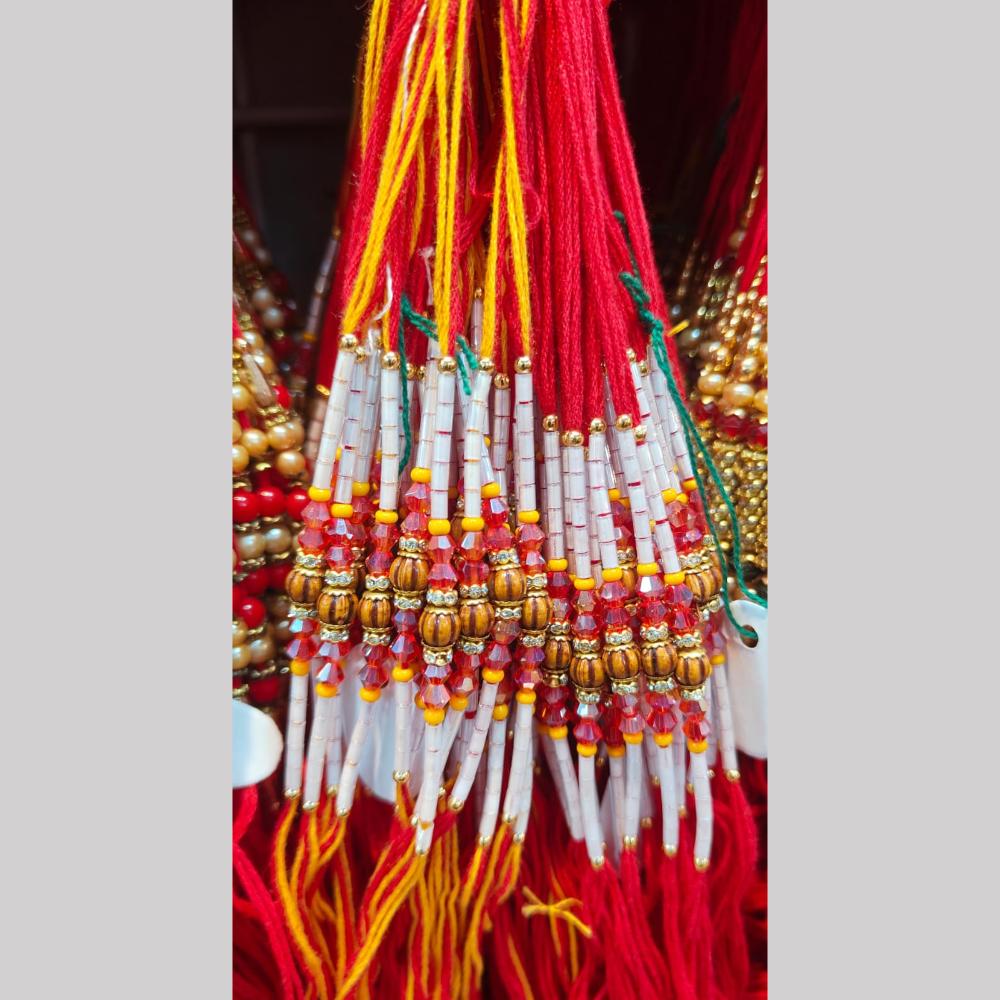 Kavita Art Pack of 12 Traditional Rakhi with Elegant Pearl Accents
