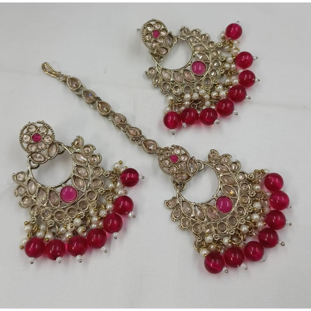 Akruti Collection Gold Plated Crystal Stone Earrings With Maangtikka