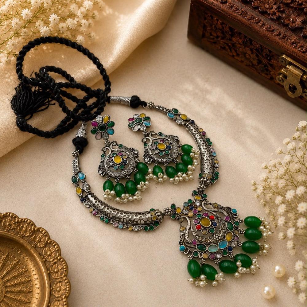 Akruti Collection Beautiful Oxidised Pota Stone And Pearl Jewellery Set