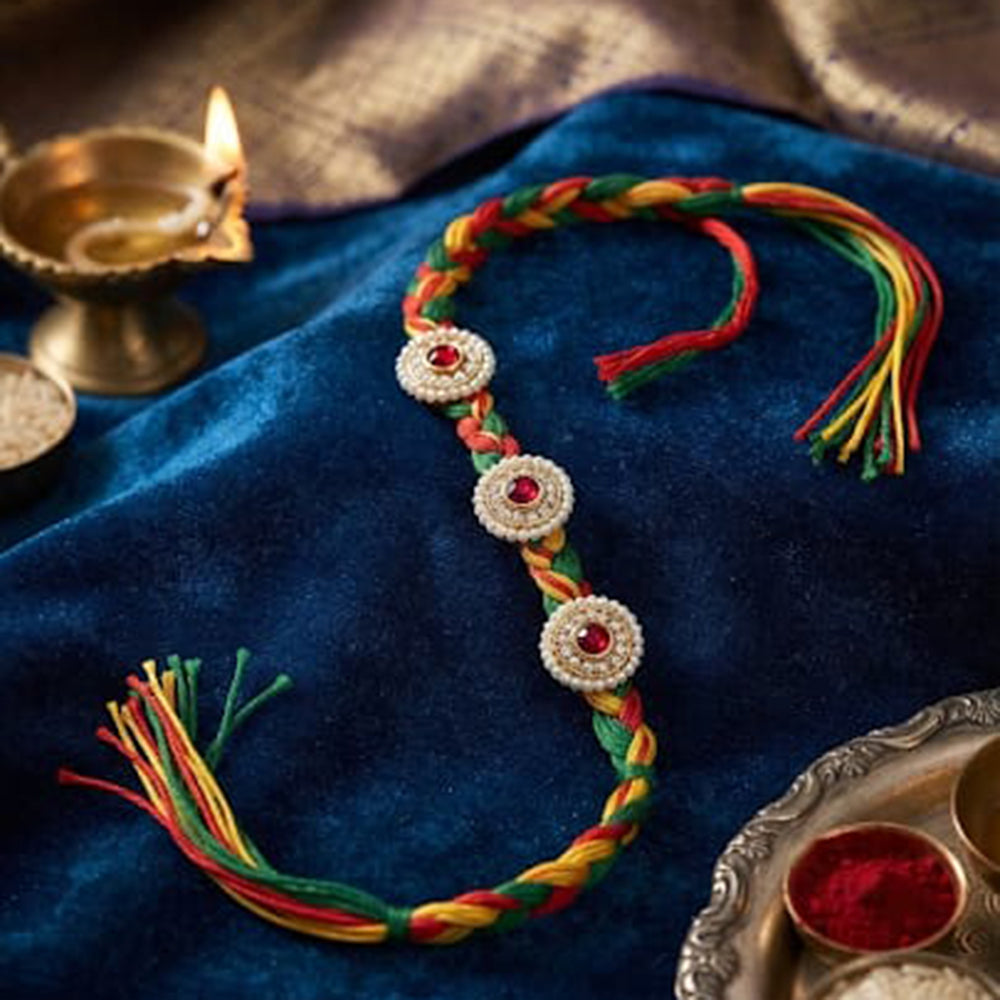 Palak Art Elegant Pota Stone And Pearl Rakhi With Traditional Design