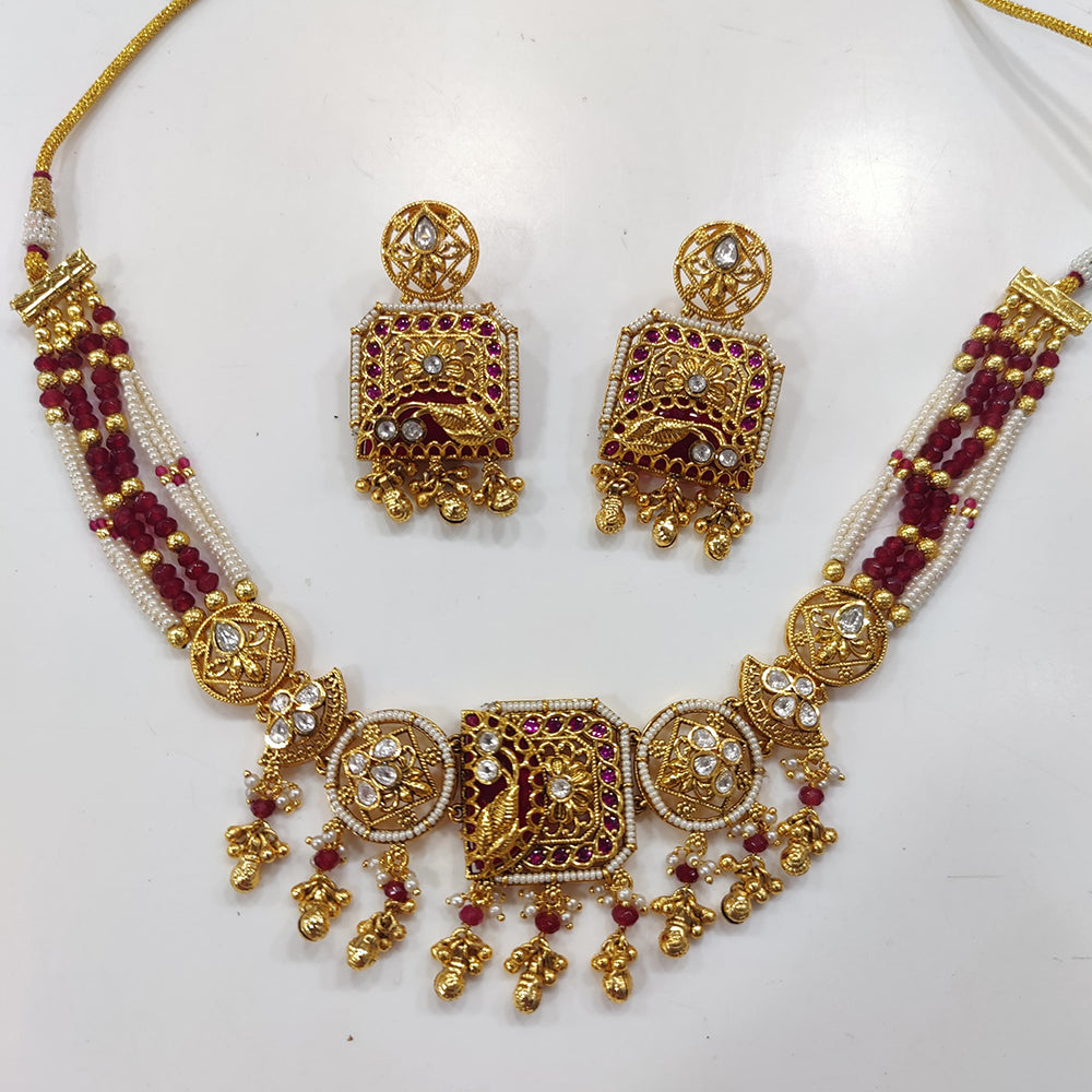 JCM Gold Plated Kundan Stone And Pearls Necklace Set
