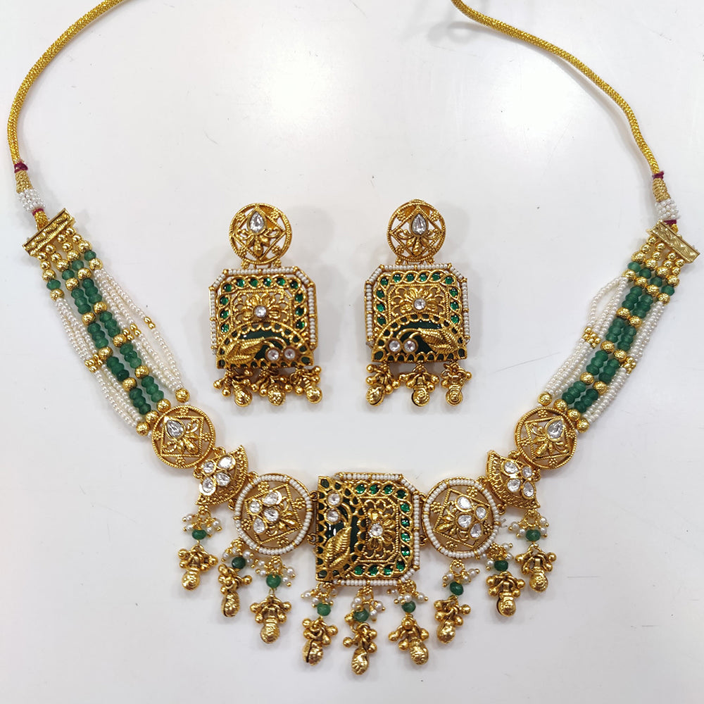 JCM Gold Plated Kundan Stone And Pearls Necklace Set