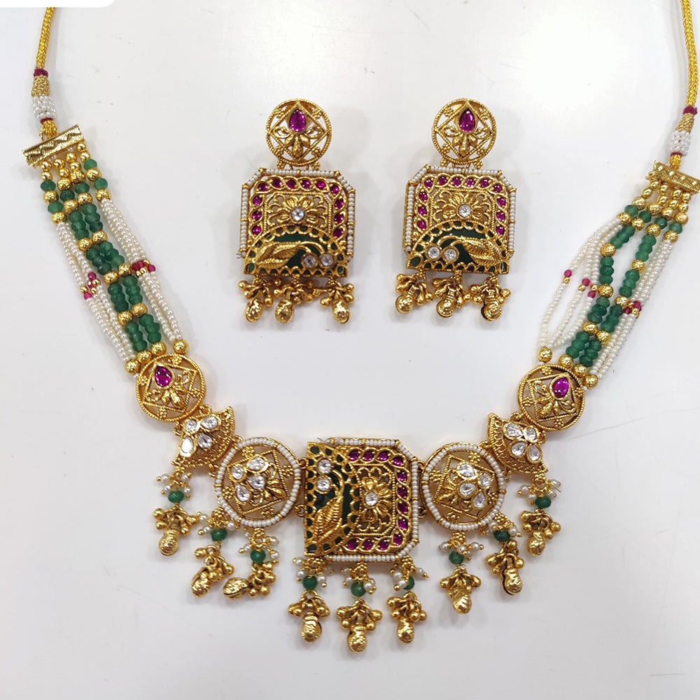 JCM Gold Plated Kundan Stone And Pearls Necklace Set