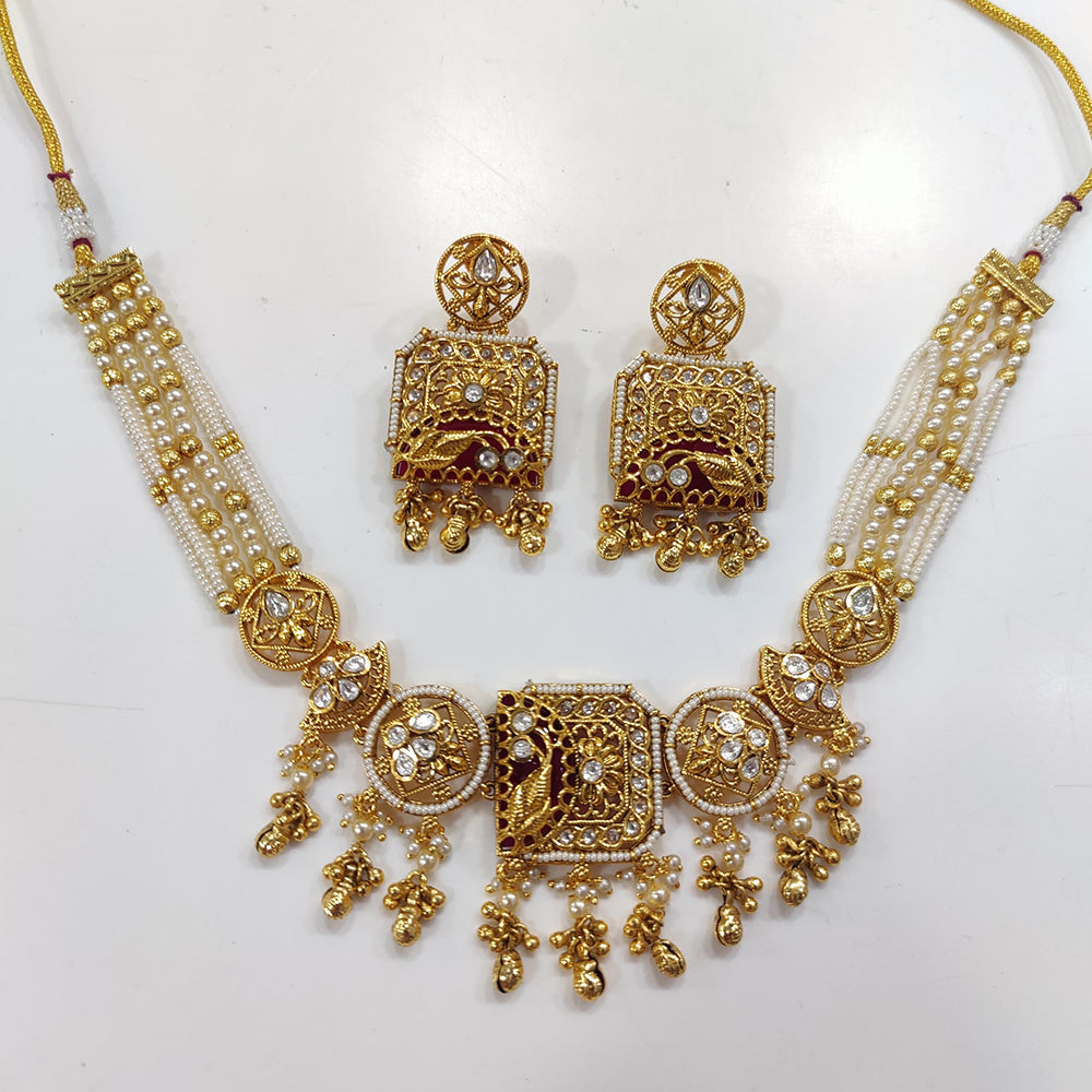 JCM Gold Plated Kundan Stone And Pearls Necklace Set