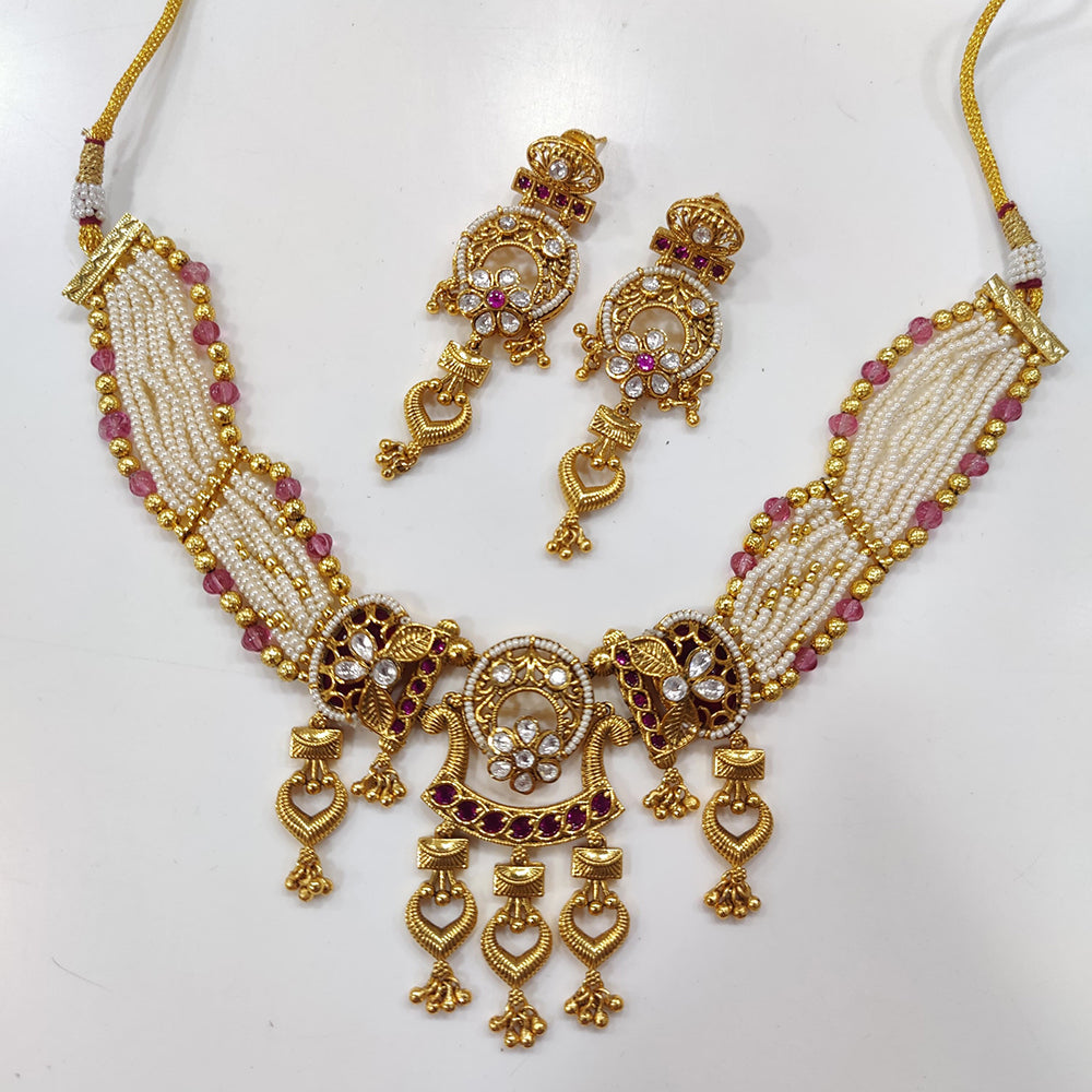 JCM Gold Plated Kundan Stone And Pearls Necklace Set