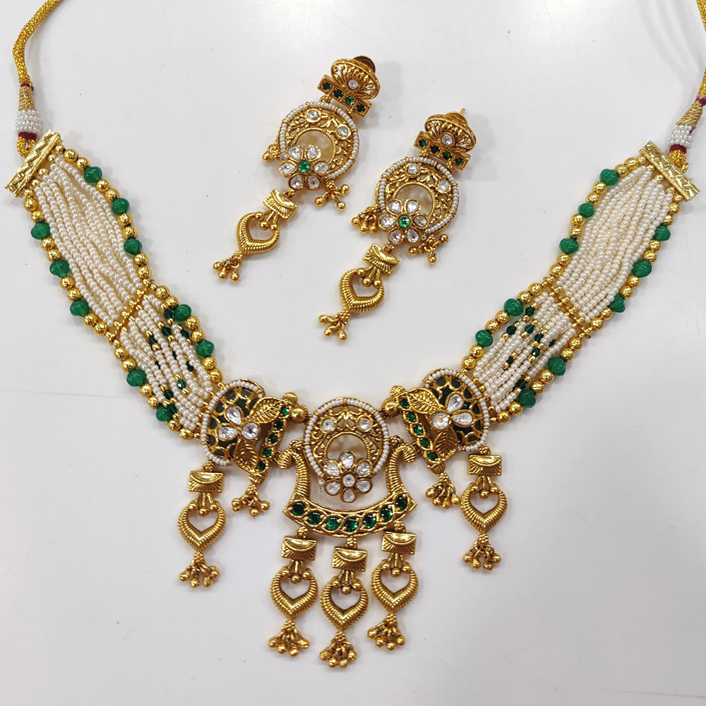 JCM Gold Plated Kundan Stone And Pearls Necklace Set