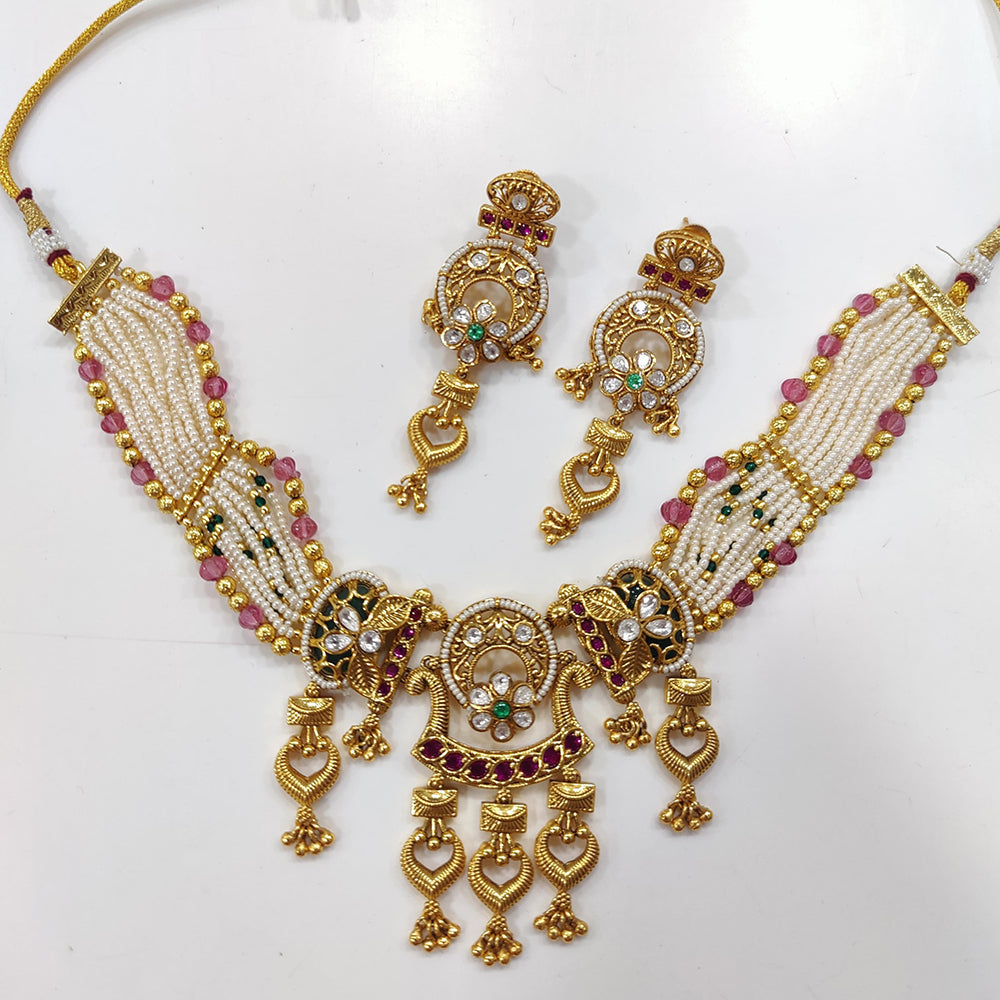 JCM Gold Plated Kundan Stone And Pearls Necklace Set