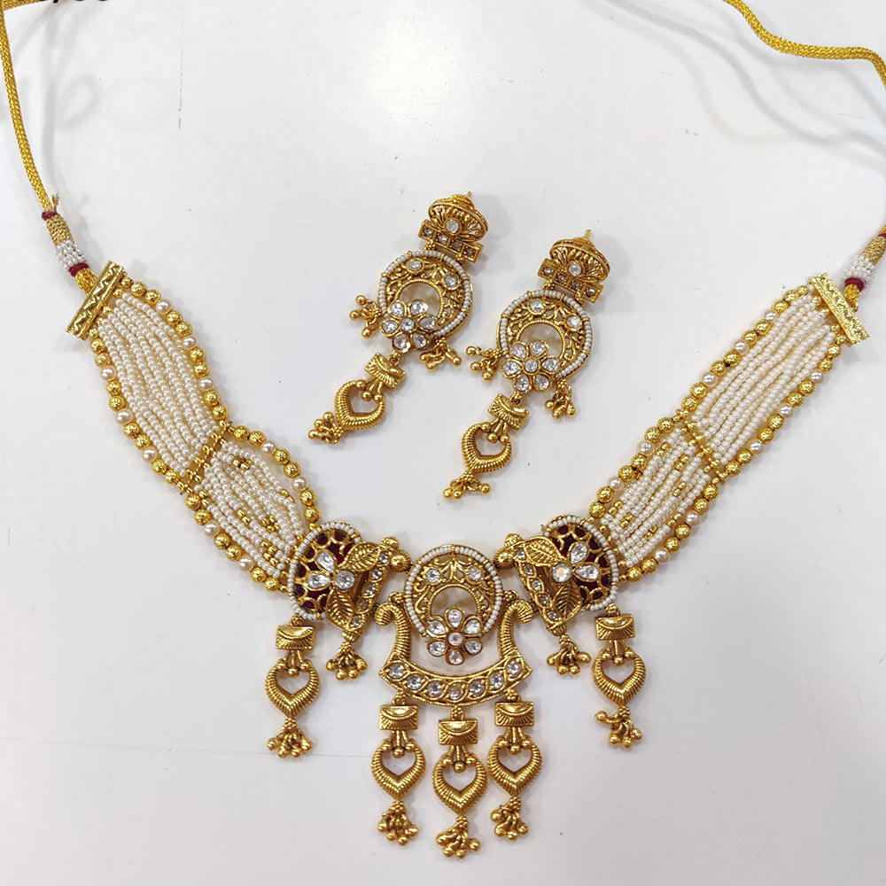 JCM Gold Plated Kundan Stone And Pearls Necklace Set