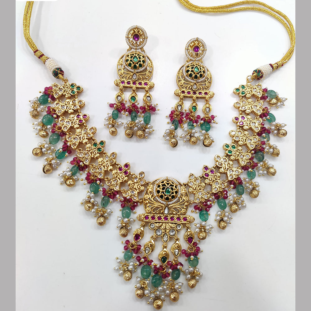 JCM Gold Plated Kundan Stone And Pearls Necklace Set