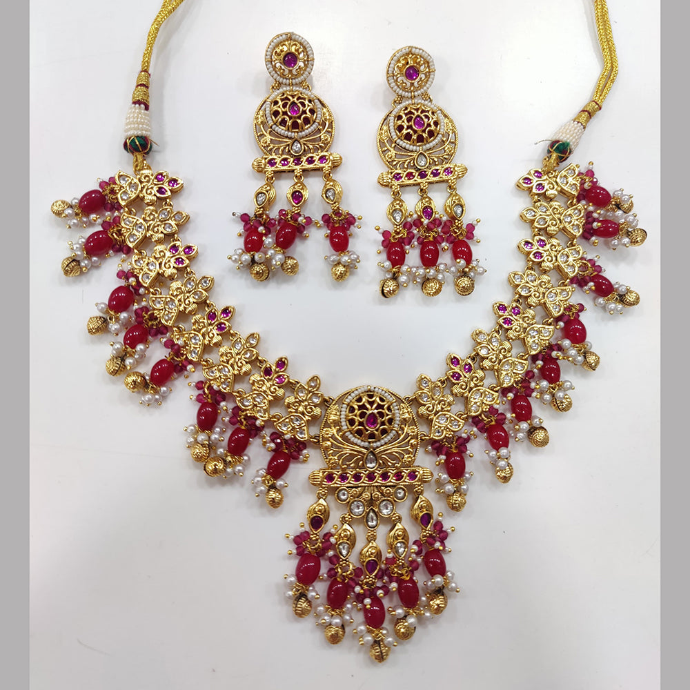 JCM Gold Plated Kundan Stone And Pearls Necklace Set