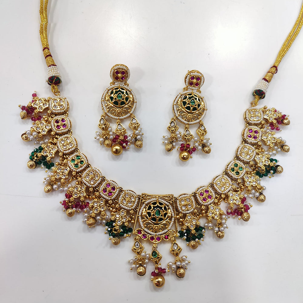 JCM Gold Plated Kundan Stone And Pearls Necklace Set
