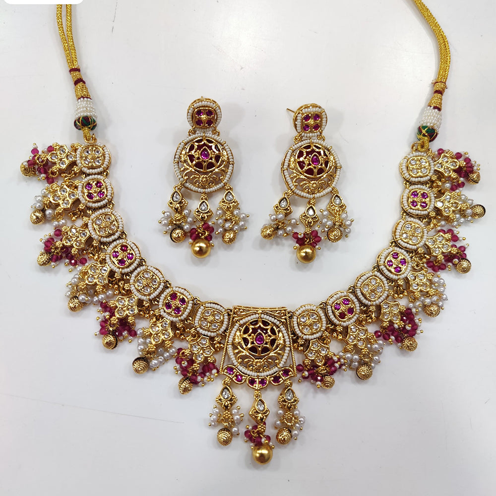 JCM Gold Plated Kundan Stone And Pearls Necklace Set