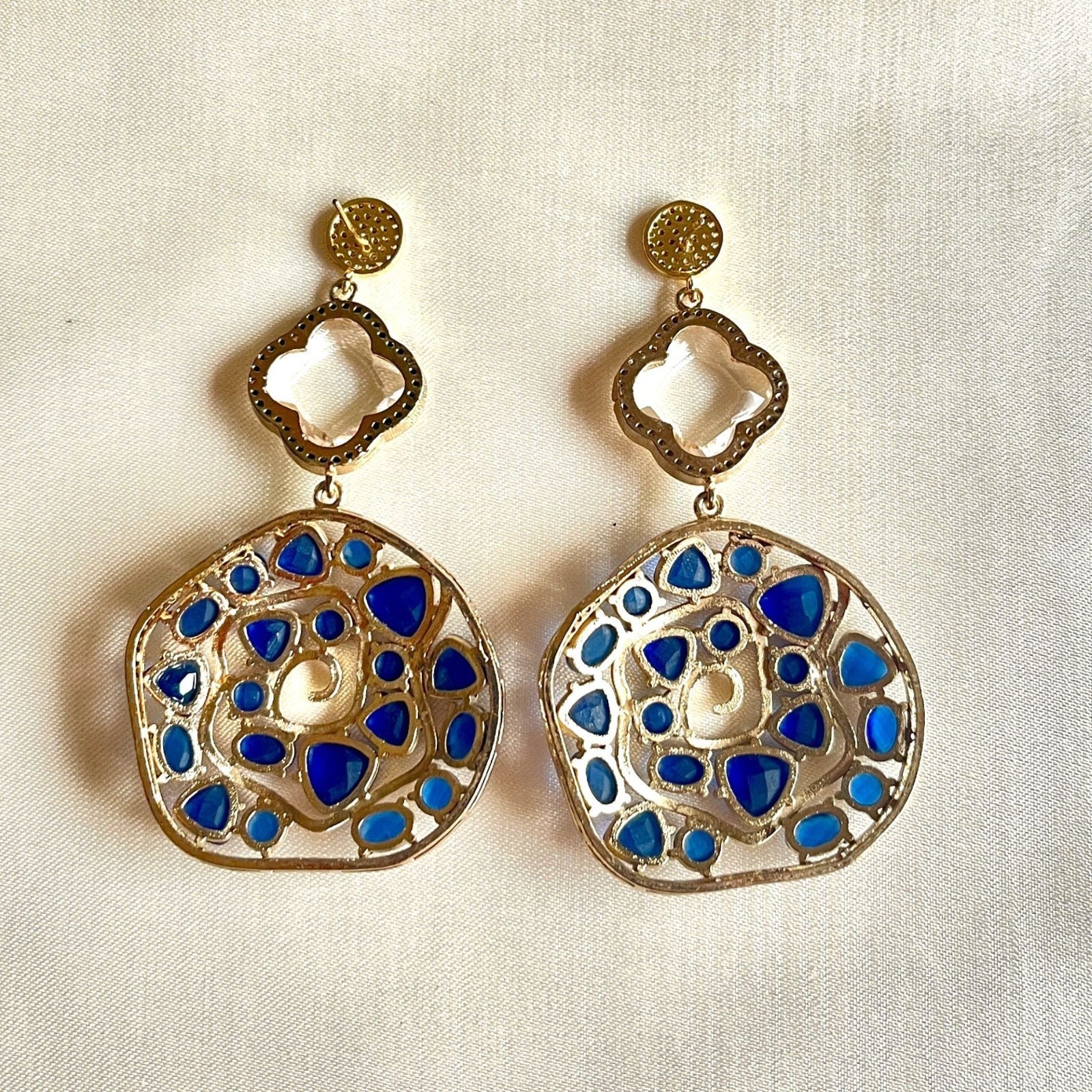 Jewel Treatzz Irregular Shaped Blue Doublet Stone, Transparent Four Petal Clover Flower And CZ Stone Gold Plated Chandlelier Earrings