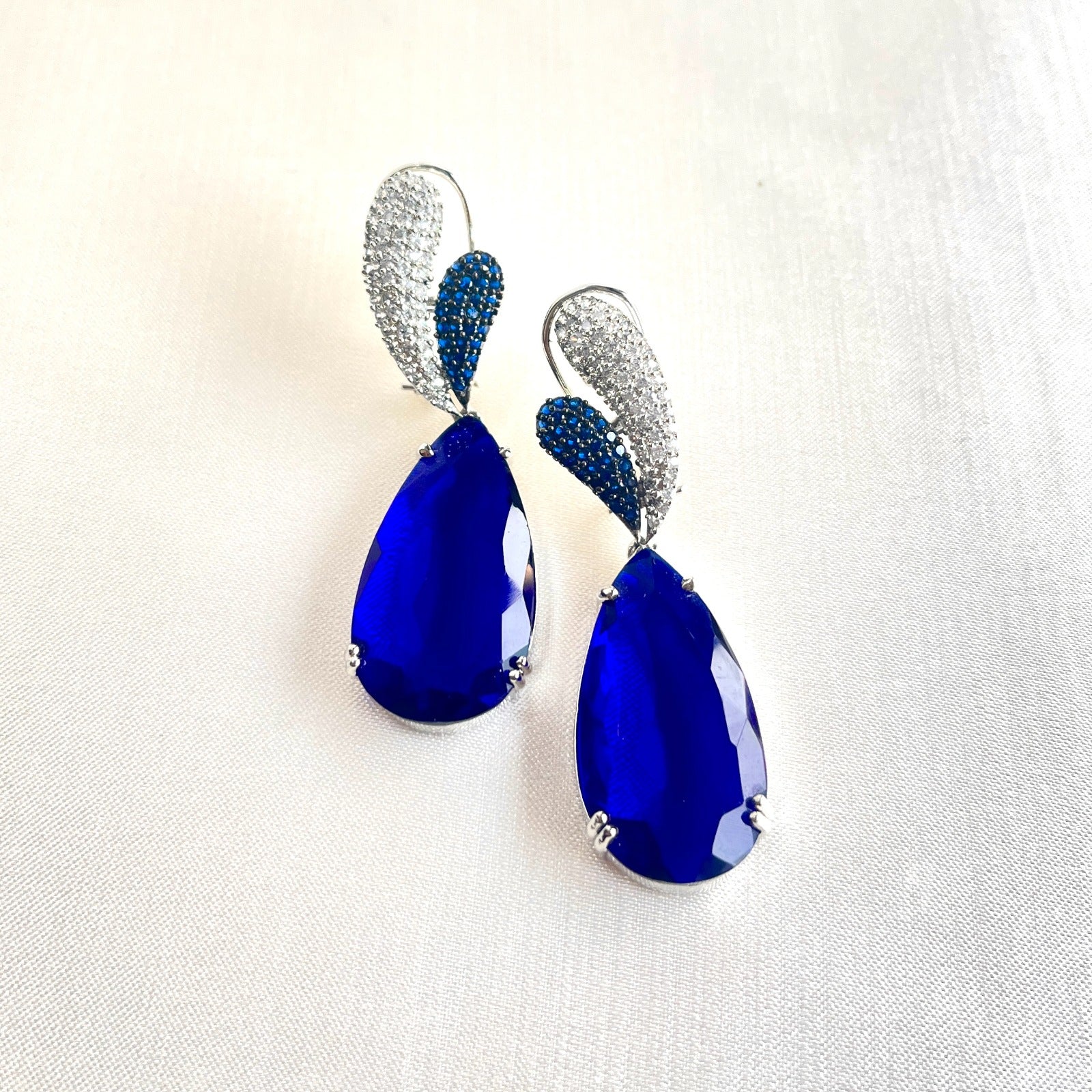 Jewel Treatzz Rhodim Plated, Pear Shaped Blue Shapphire Doublet Stone & Cubic Zirconia's Dangler Earrings