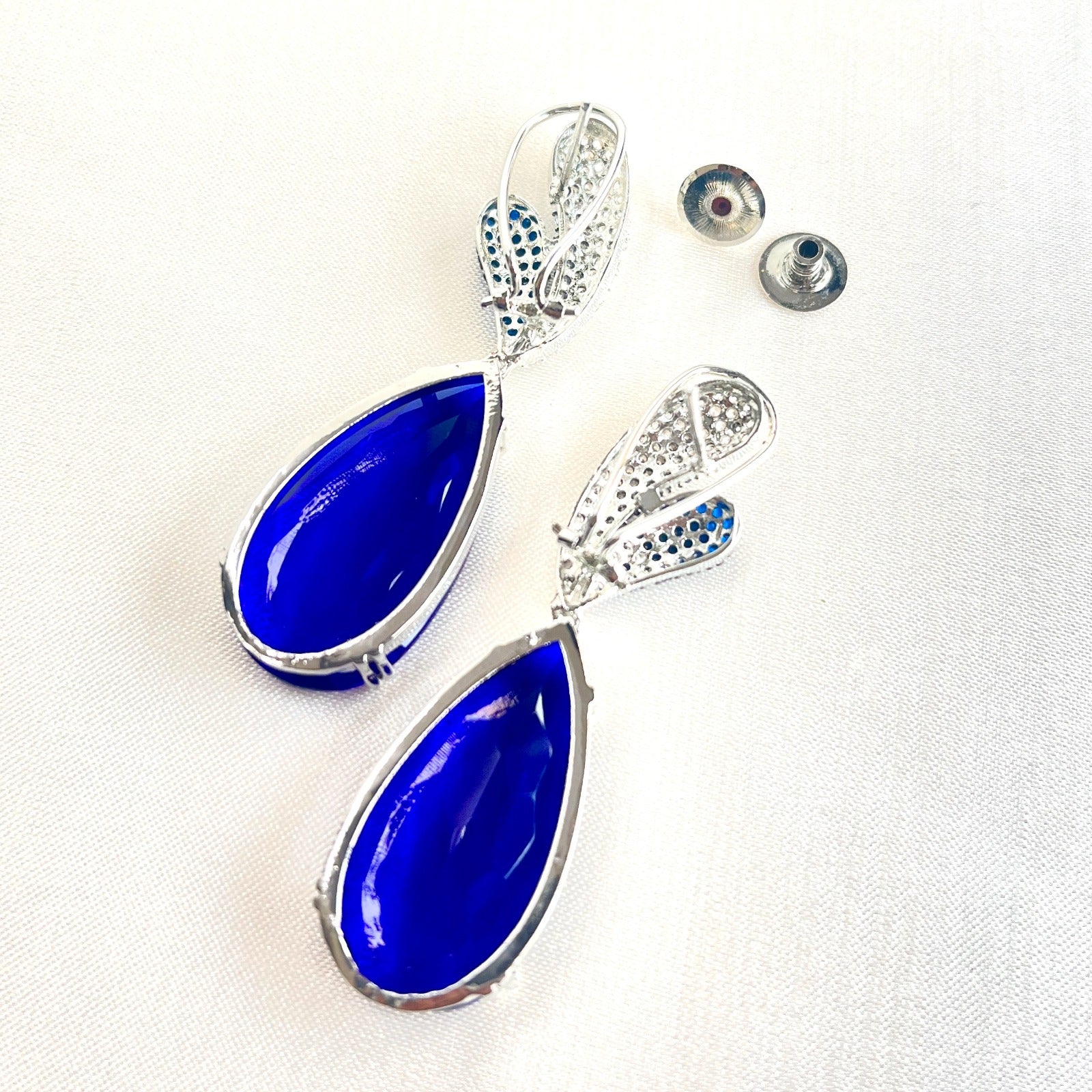 Jewel Treatzz Rhodim Plated, Pear Shaped Blue Shapphire Doublet Stone & Cubic Zirconia's Dangler Earrings