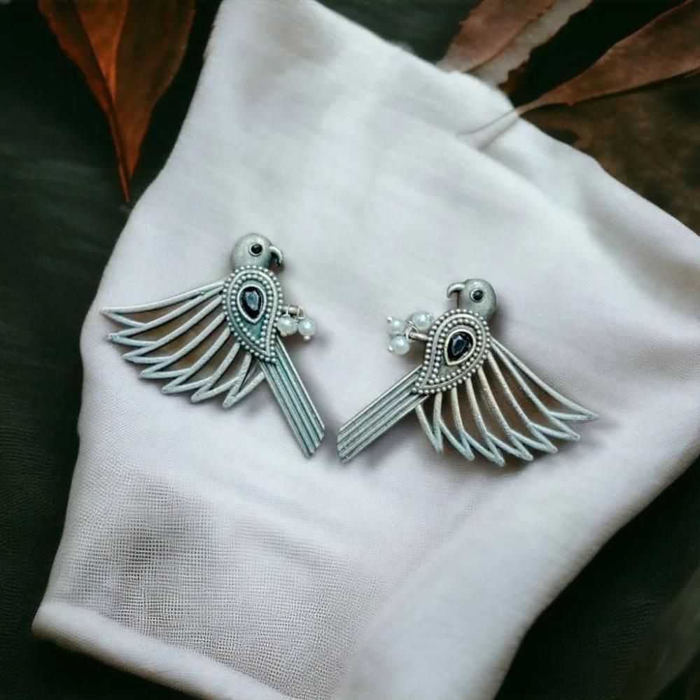 Maharani Jewels Inspired Oxidised Plated Pota & Pearl Detailing Bird Dangler Earrings