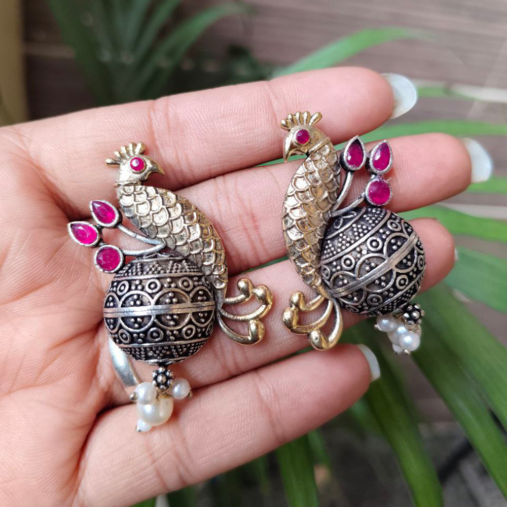 Maharani Jewels Inspired Oxidised Plated Pota And Pearl Detailing Peacock Dangler Earrings