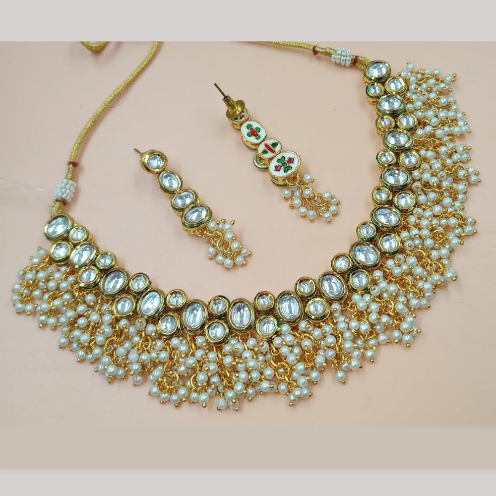 NAFJ Gold Plated Kundan Stone And Pearls Necklace Set