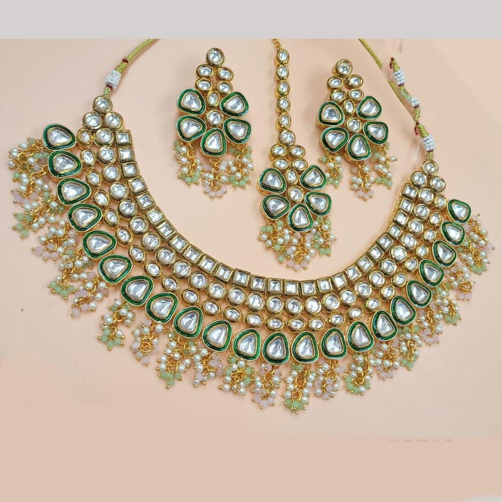 NAFJ Gold Plated Kundan Stone And Pearls Necklace Set