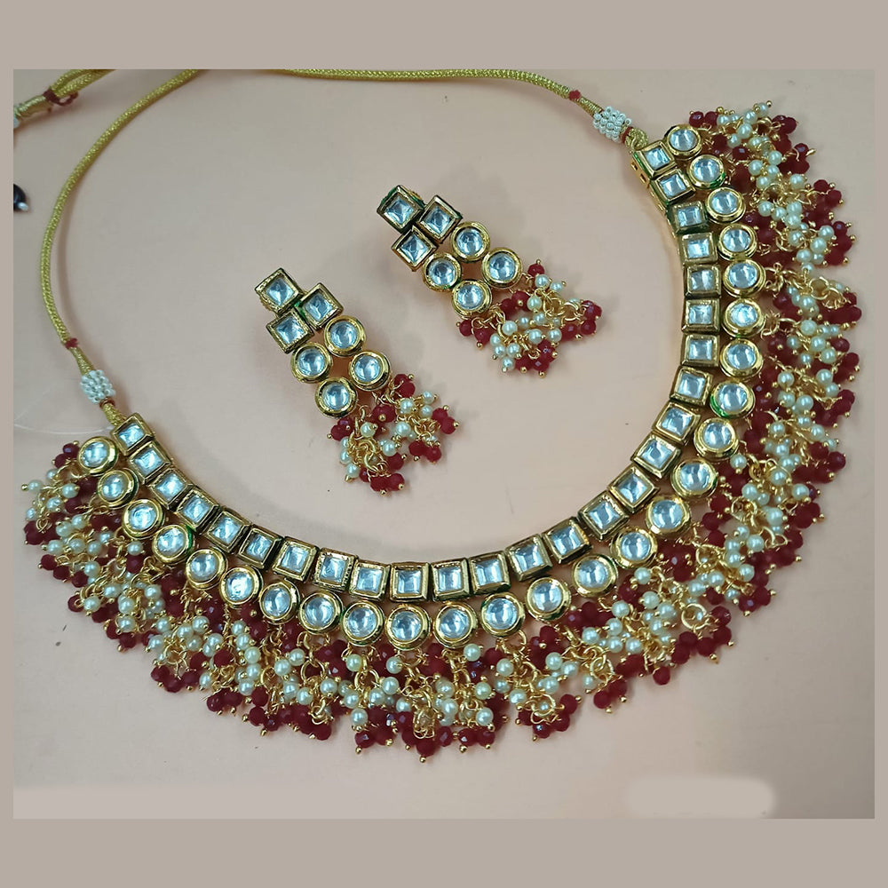 NAFJ Gold Plated Kundan Stone And Pearl Necklace Set
