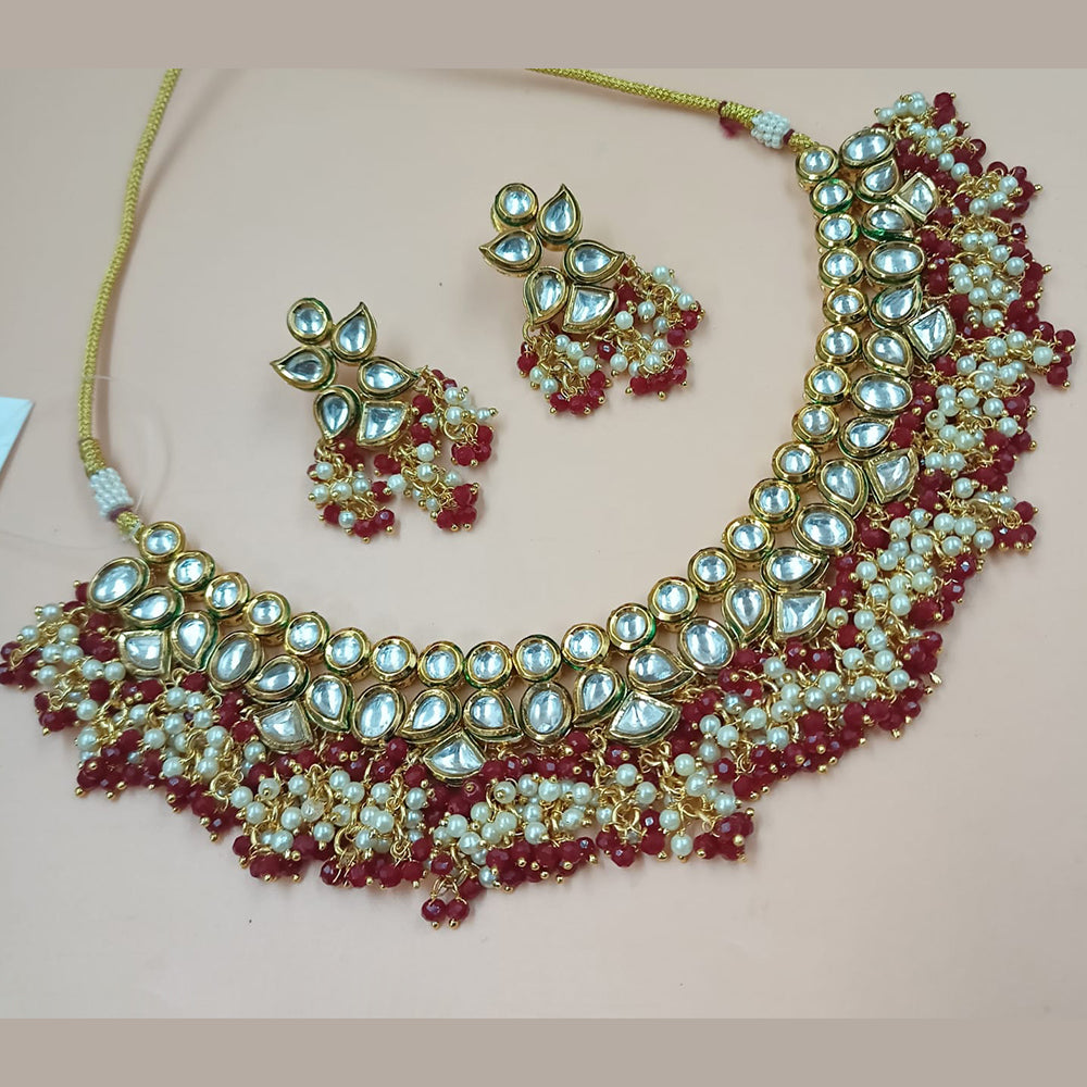 NAFJ Gold Plated Kundan Stone And Pearl Necklace Set