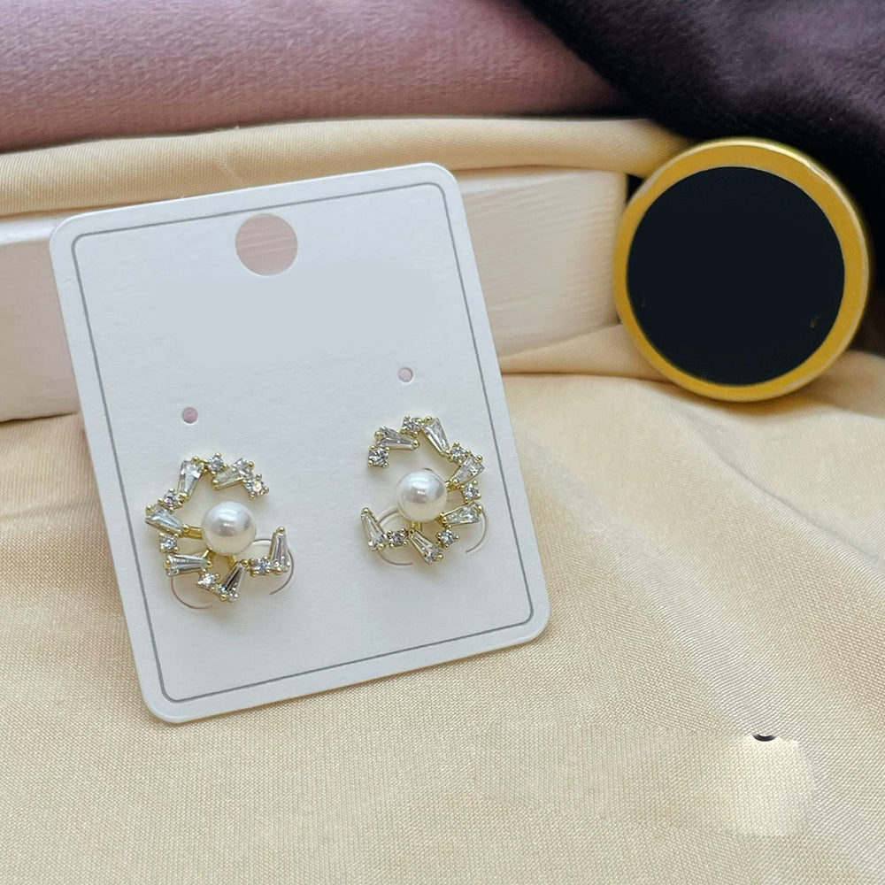 Klitz Stylish Stainless Steel Austrian Stone And Pearl Studs Earrings