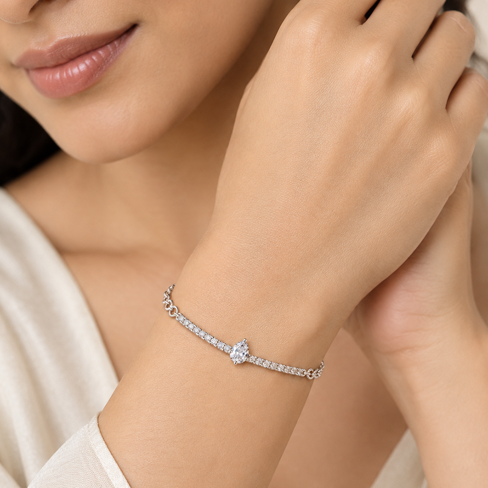 Urthn Everglow Silver Plated Tear Drop Shape American Diamond Fashion Bracelet for Women