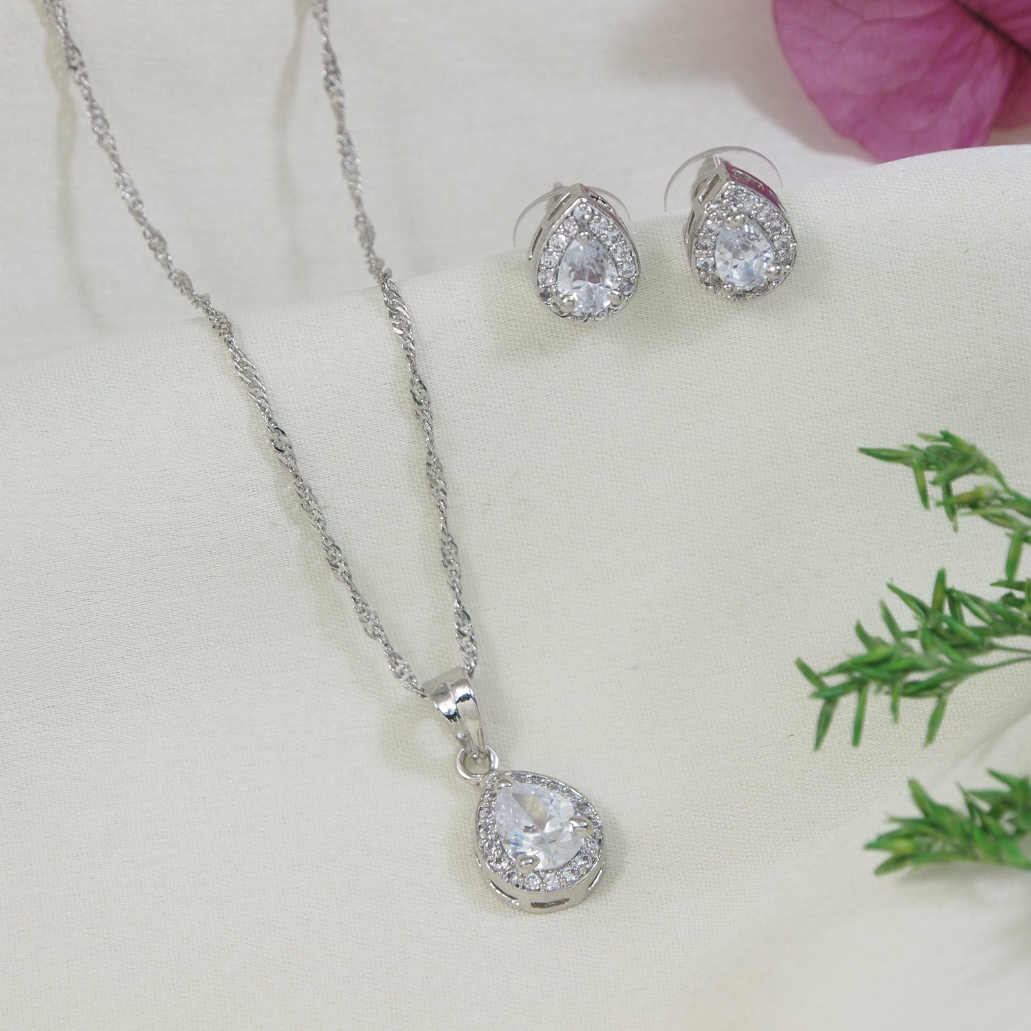 Etnico Latest Stylish Silver Plated CZ American Diamond Teardrop Pendant Necklace & Earrings Set For Women