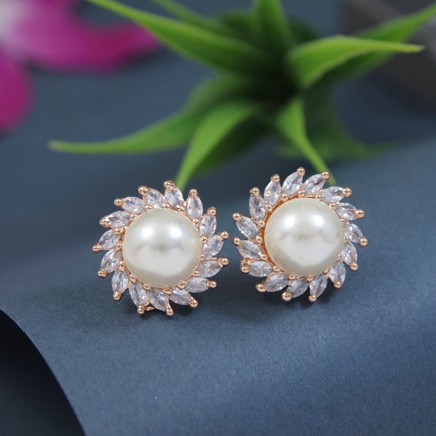 Etnico Latest Stylish Rose Gold Plated CZ American Diamond Stud Earrings For Women