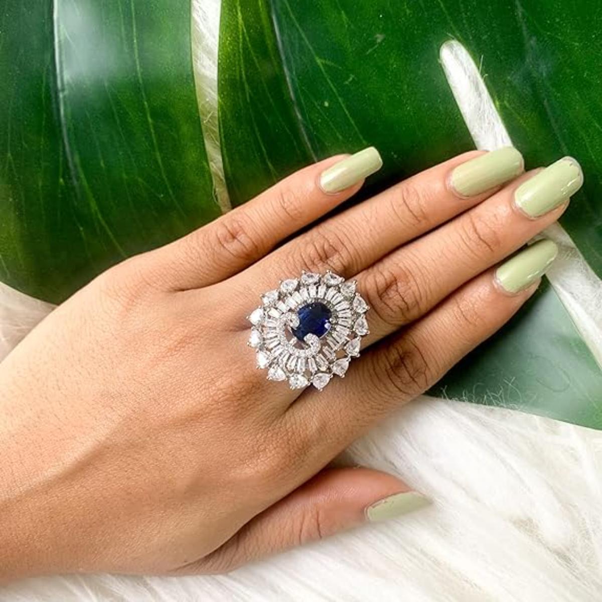 Etnico Womens Special Silver Plated CZ American Diamond Stylish Floral Shape Dazzling Adjustable Brass Finger Ring (Blue)