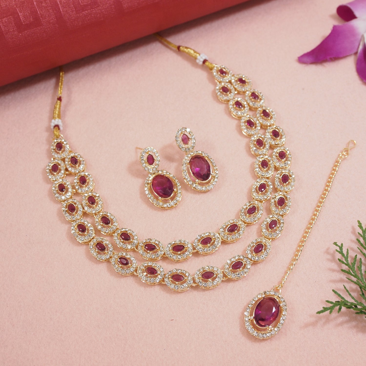 Etnico Gold Plated Stylish Design Crystal Diamond Oval Shape Necklace With Earrings & Maang Tikka Jewellery Set for Women (Wine)