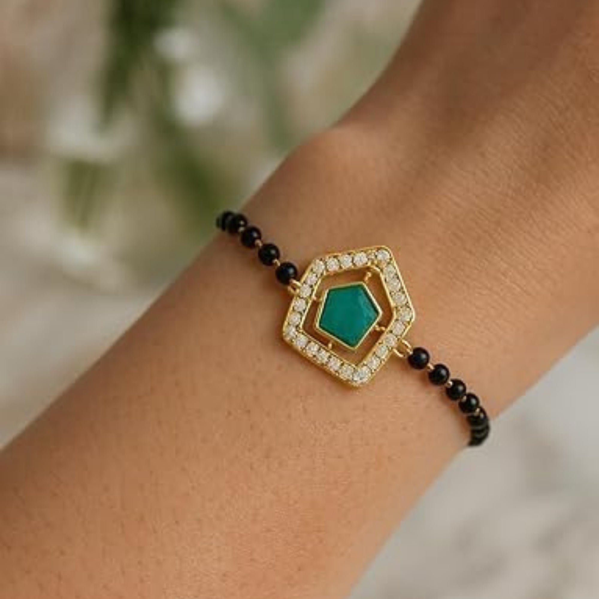 Etnico Gold Plated Traditional Adjustable Black Beads Mangalsutra Bracelet with White Pendant for Women (MB007G)