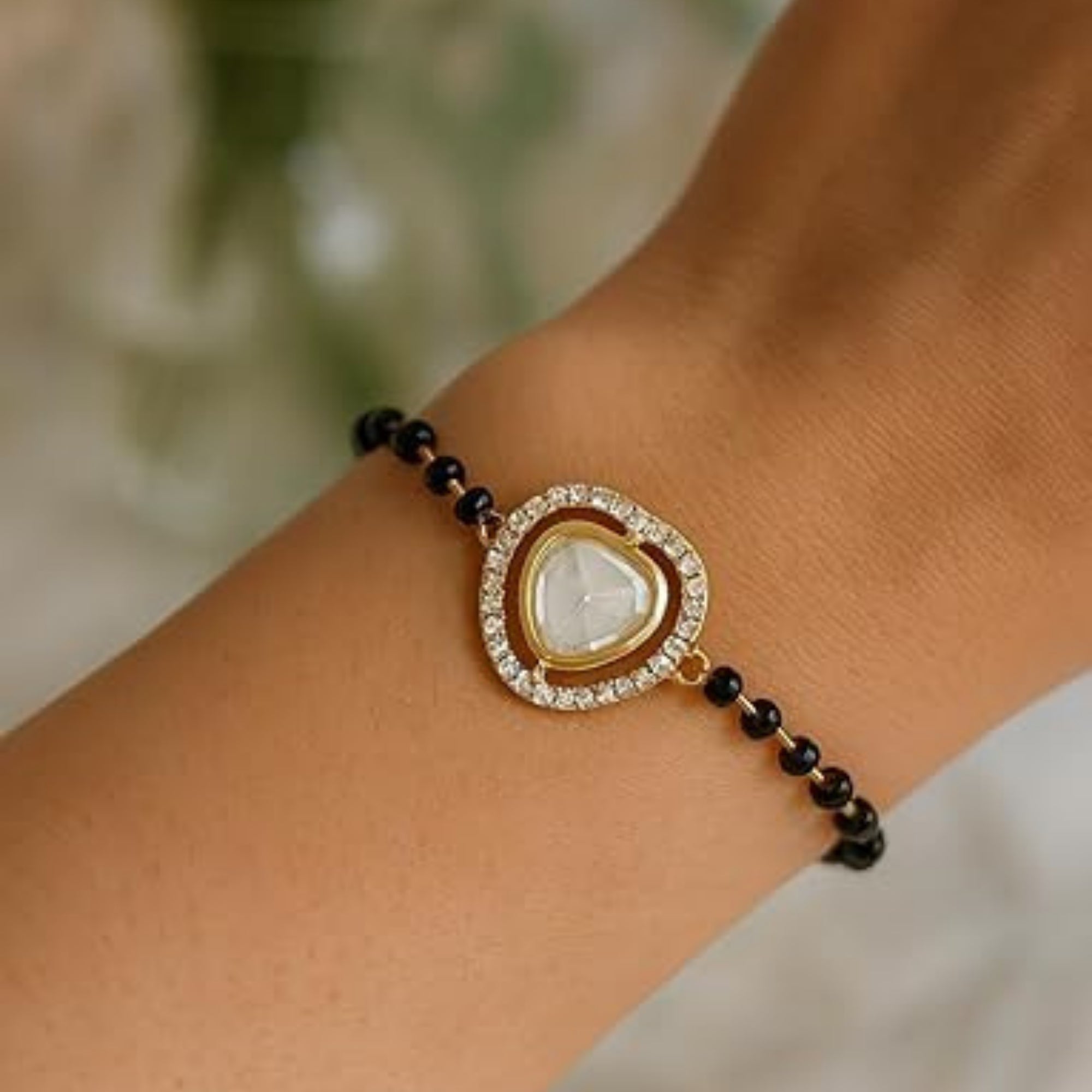 Etnico Gold Plated Traditional Adjustable Black Beads Mangalsutra Bracelet with White Pendant for Women (MB008W)