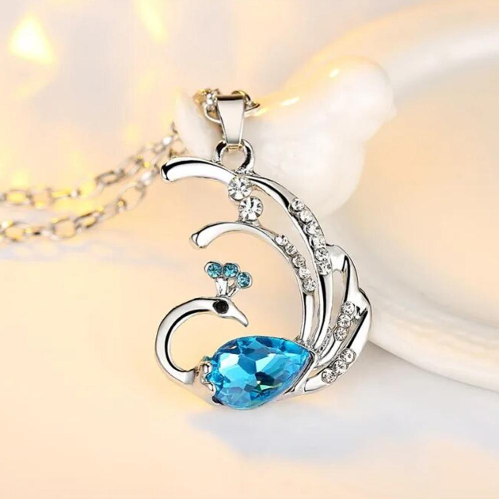 Mahi Dancing Peacock Shaped-Pendant Necklace with Aqua Blue and White Crystals for Women (PS1101885R)