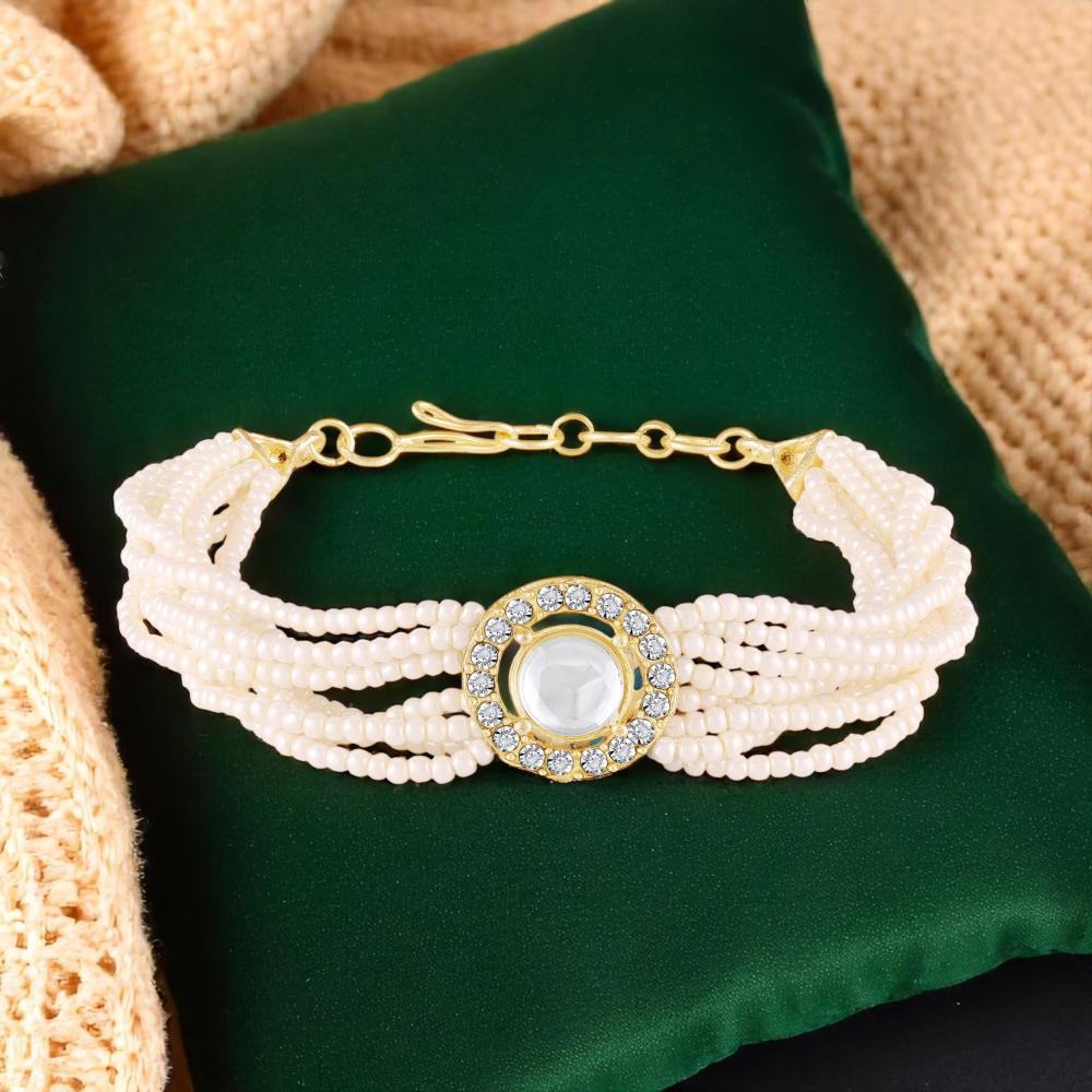 Mahi Elegant White Artificial Pearl Lumba Rakhi for Bhabhi | Multi-Strand Bracelet with Crystal Centerpiece & Gold Finish (RAL1100853G)