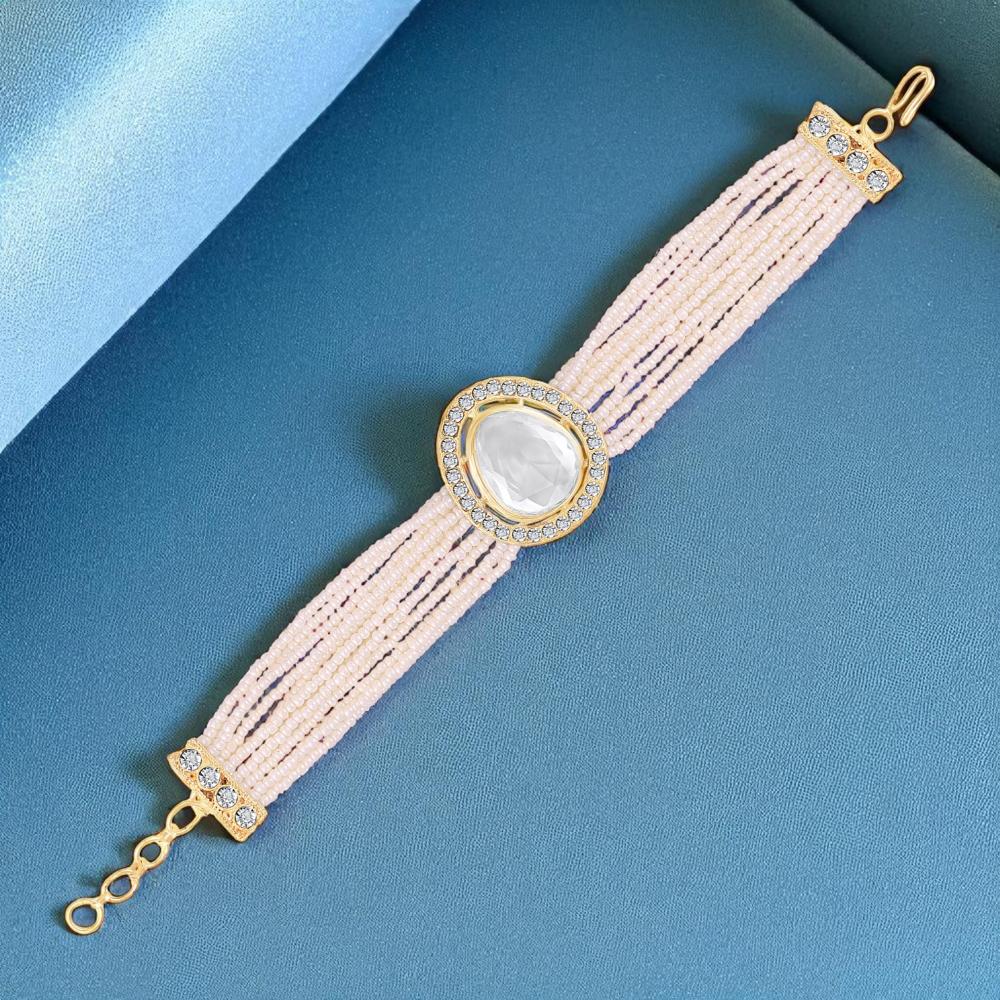 Mahi Elegant White Artificial Pearl Lumba Rakhi for Bhabhi | Multi-Strand Bracelet with Crystal Centerpiece & Gold Finish (RAL1100854G)