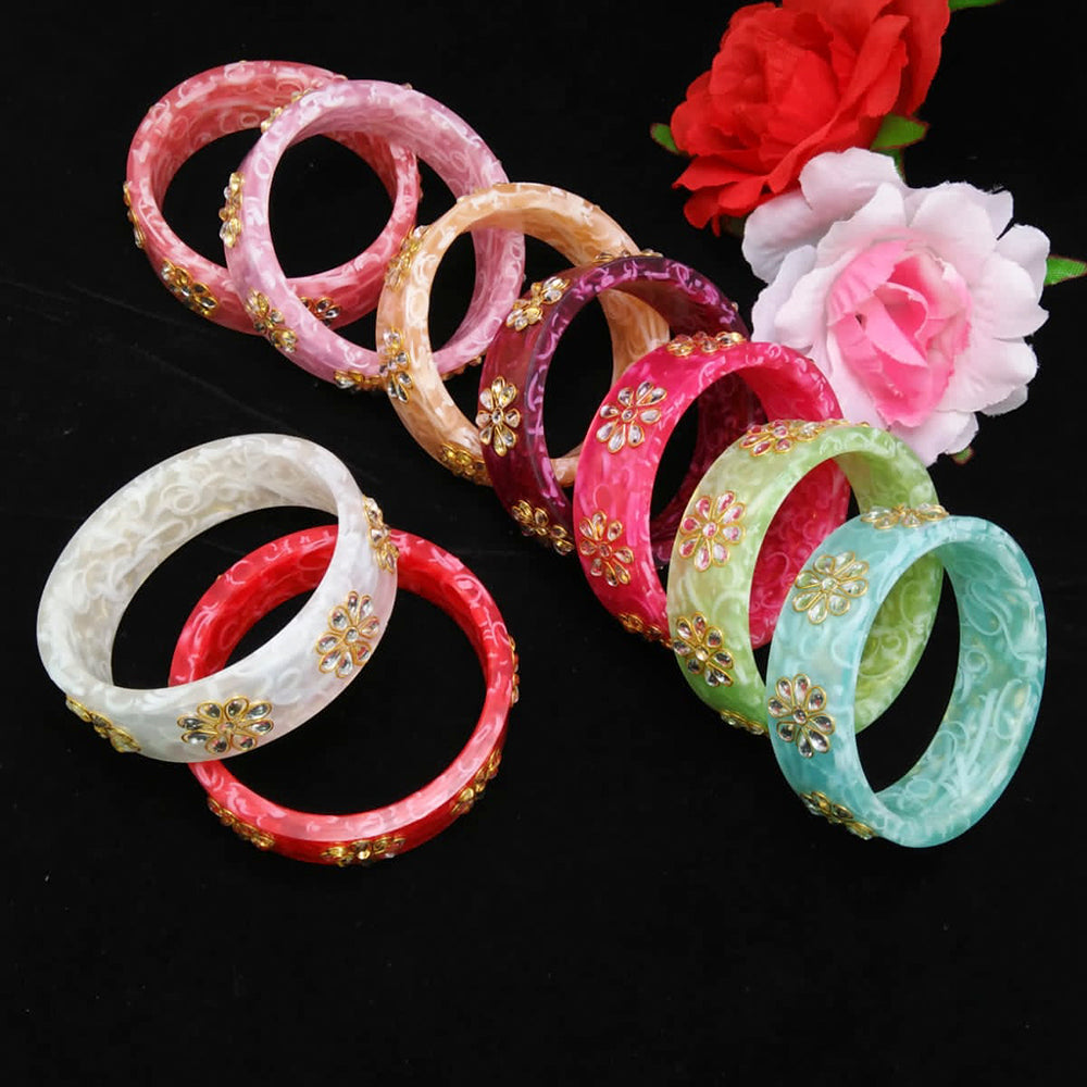 Latest plastic deals bangles design