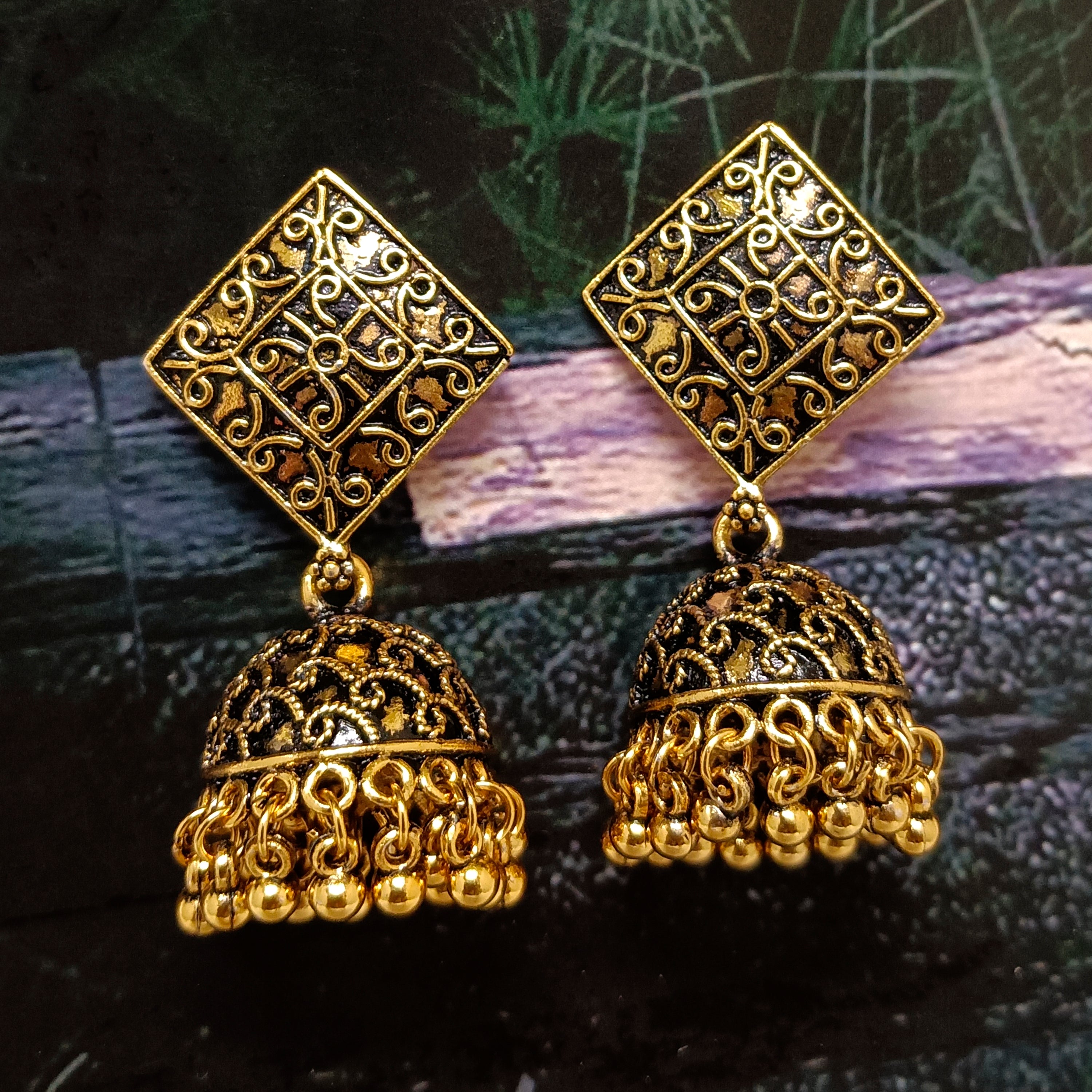 Woma Jhumkis Earrings