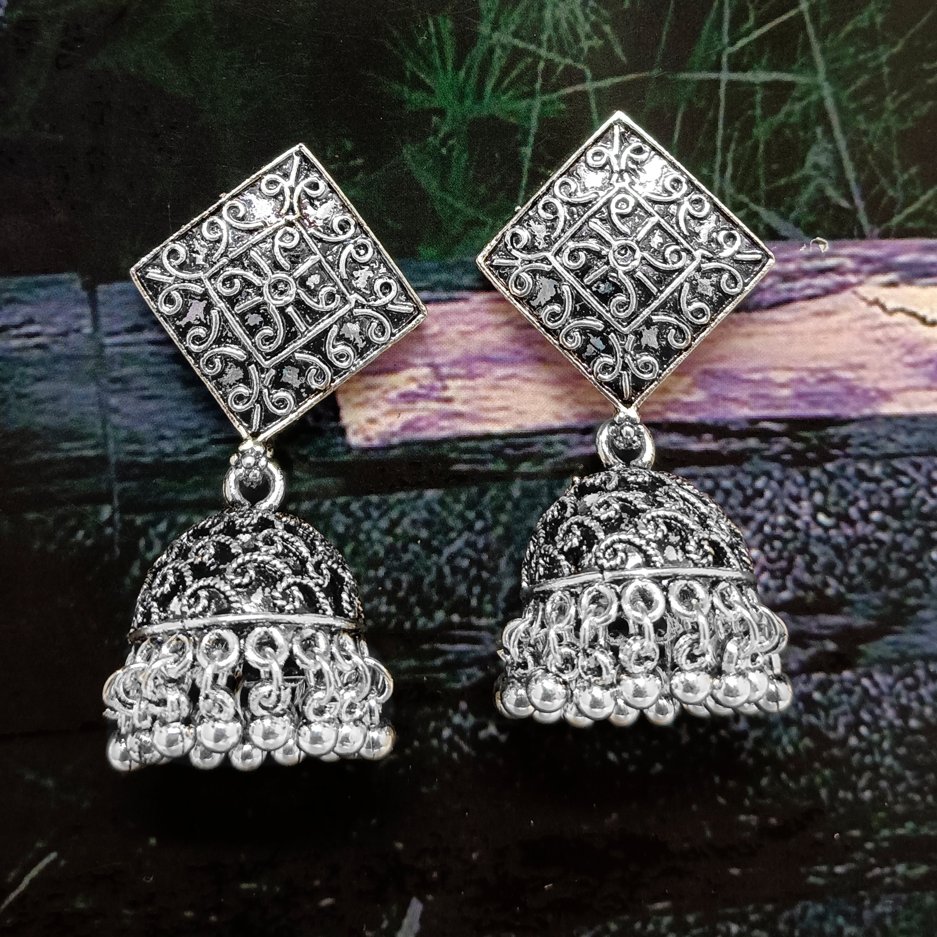 Woma Jhumkis Earrings