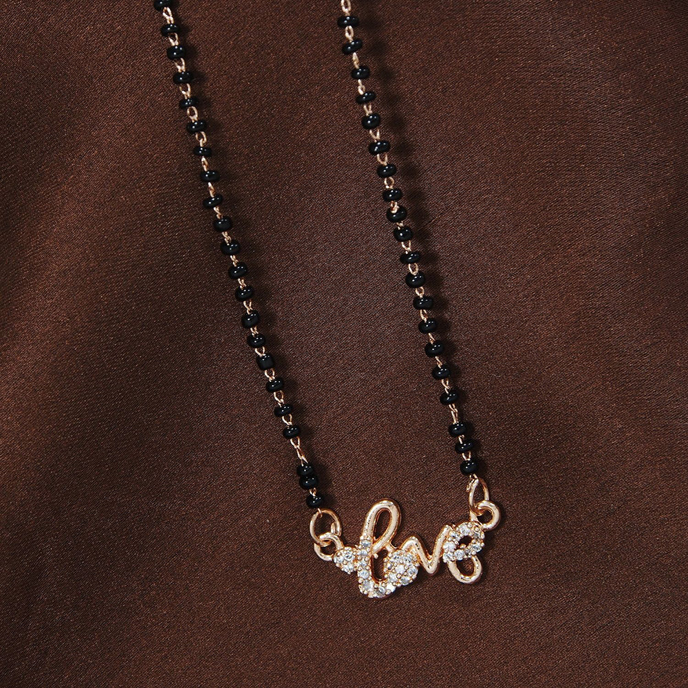 Etnico 18k Rose Gold Plated Traditional Single Line American Diamond Lovers Design Pendant with Black Beads Chain Mangalsutra for Women (D092)