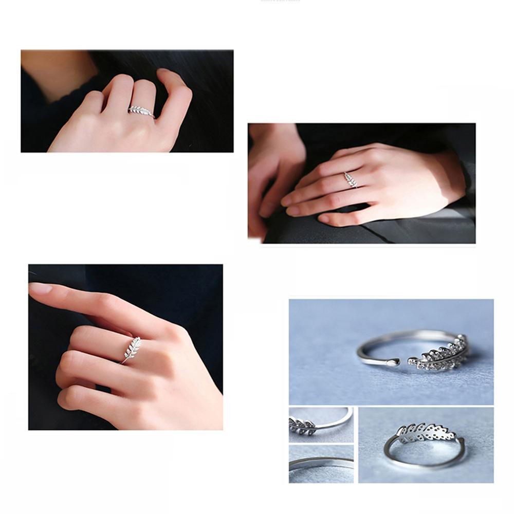 Mahi Rhodium Plated Cute Leafy Adjustable Finger Ring With Crystal