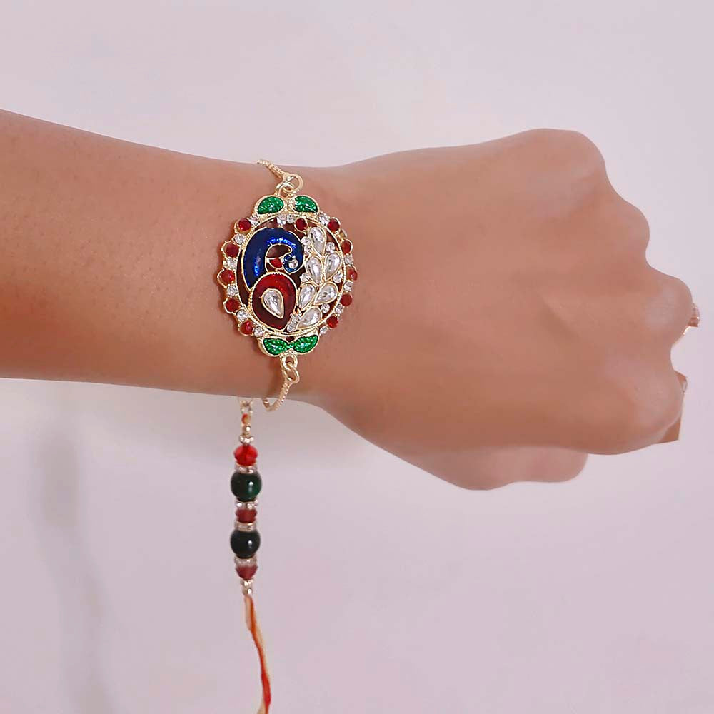 Mahi Peacock Shaped Meenakari Work Lumba Rakhi for Bhabhi with Beads and Crystals (RAL1100680G)