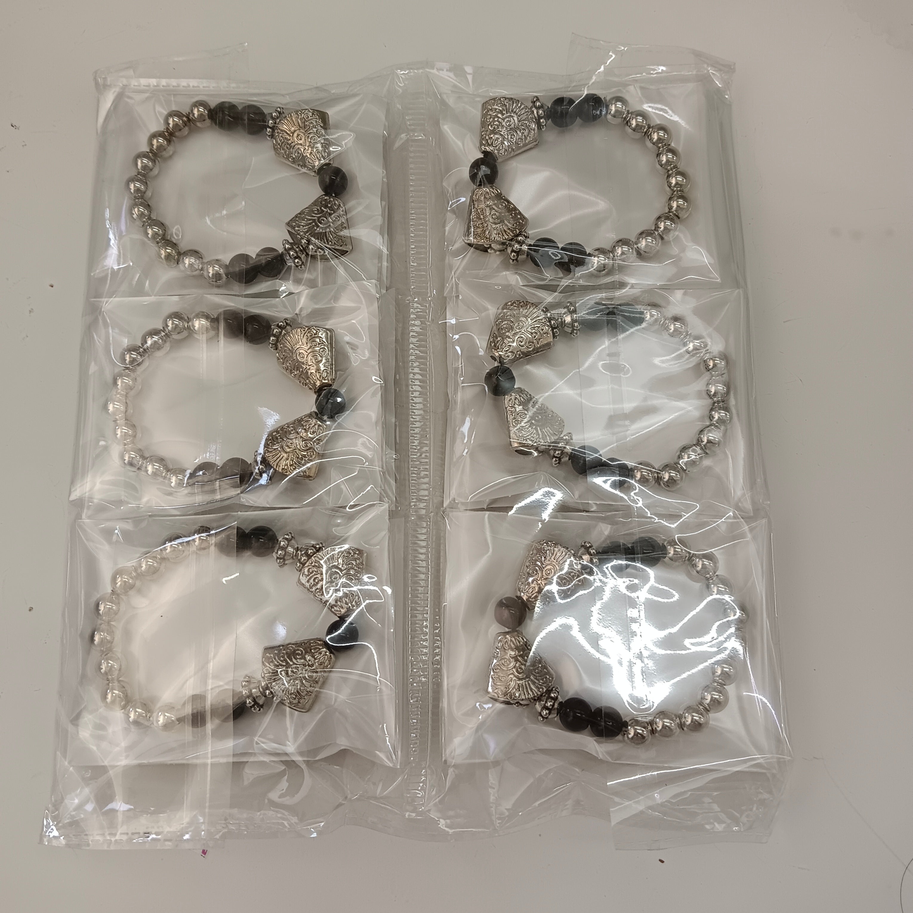 Urthn Oxidised Plated Charm Black Beads Bracelet Set (Set of 12)
