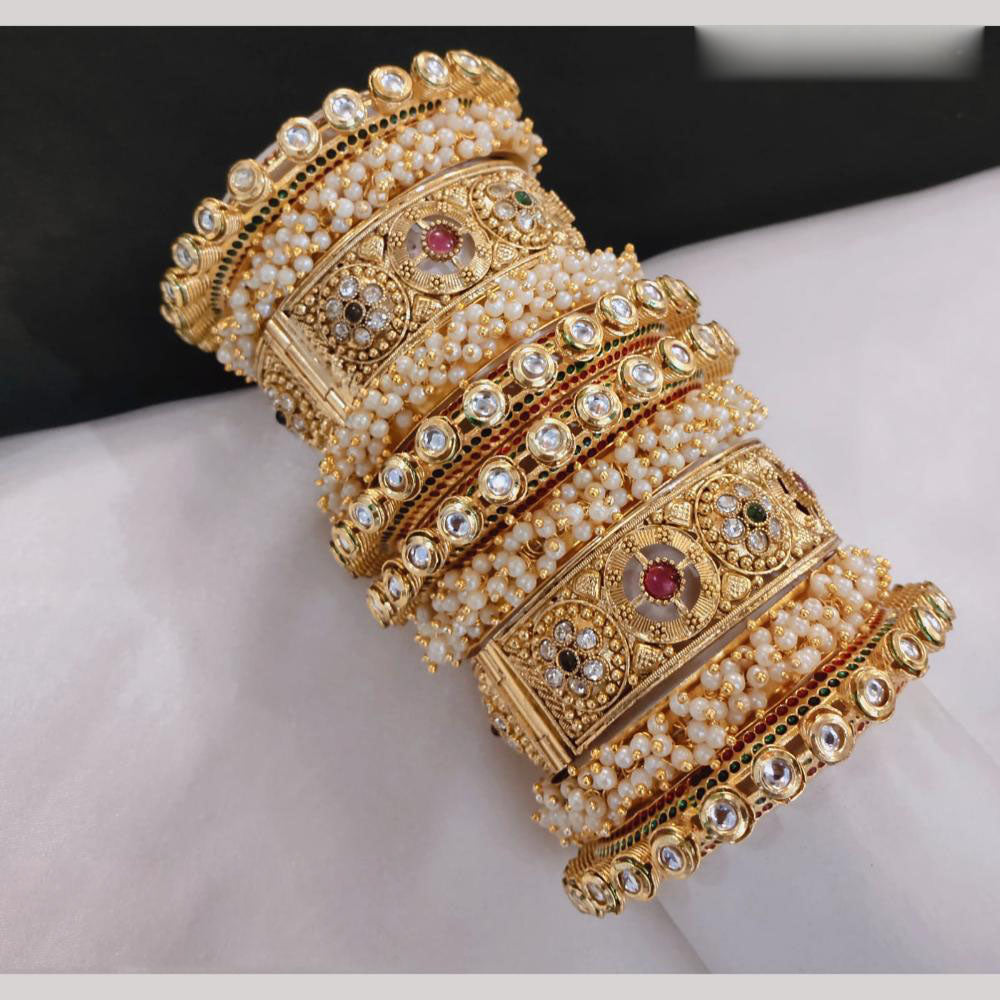 Lucentarts Jewellery Gold Plated Kundan And Pearl Bangles Set
