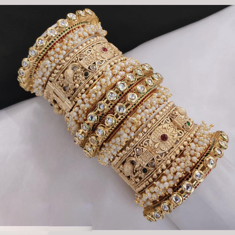 Lucentarts Jewellery Gold Plated Kundan And Pearl Bangles Set